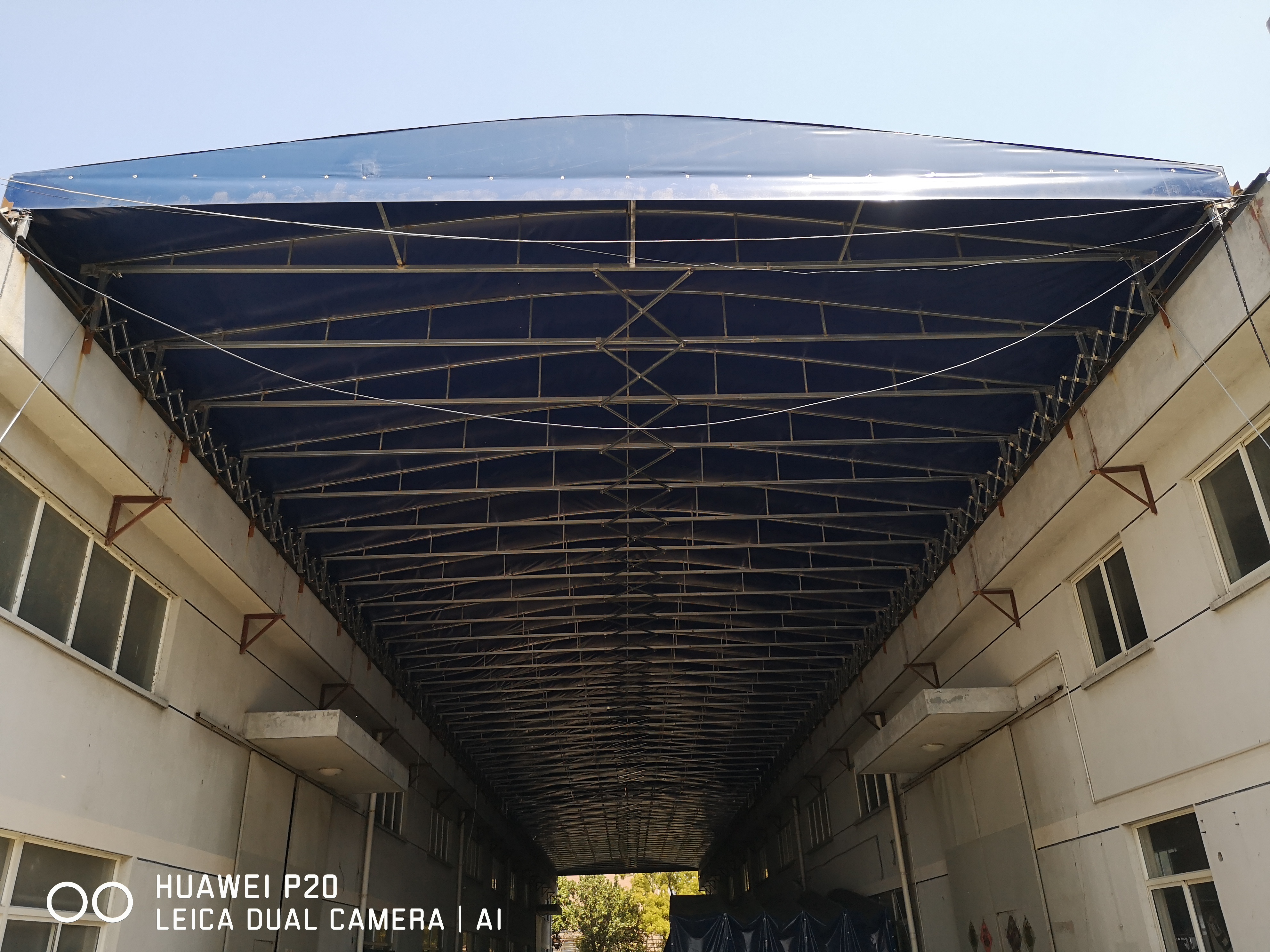 蘇（sū）州大神红桃17·c18起草遮陽材料有限公司—雨棚（péng）行業放心（xīn）企業